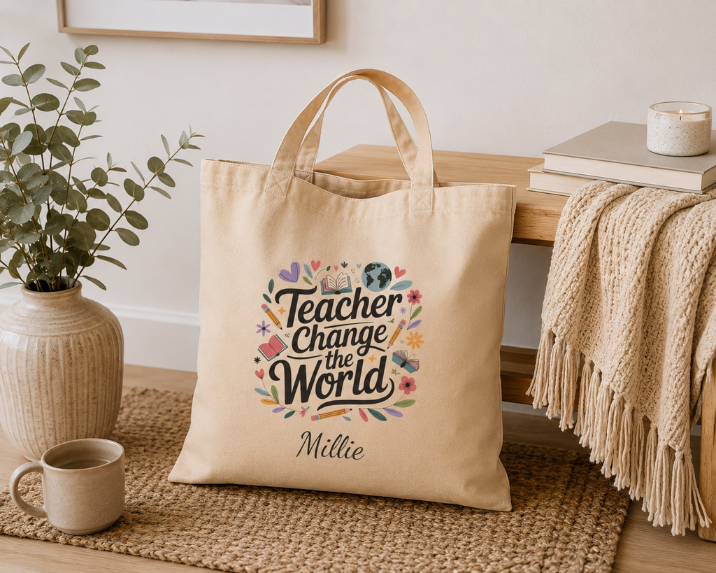 Close-up of book and globe illustration and personalized name on teacher tote