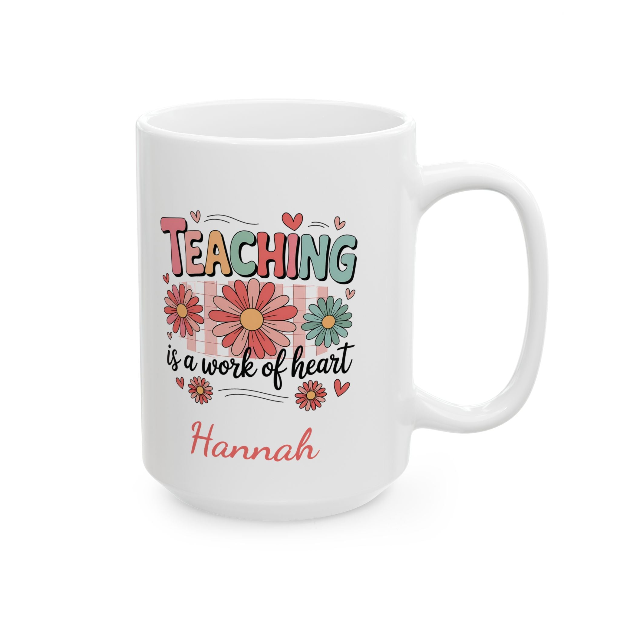 Teaching Work of Heart mug lifestyle shot showing name and colorful daisy illustrations