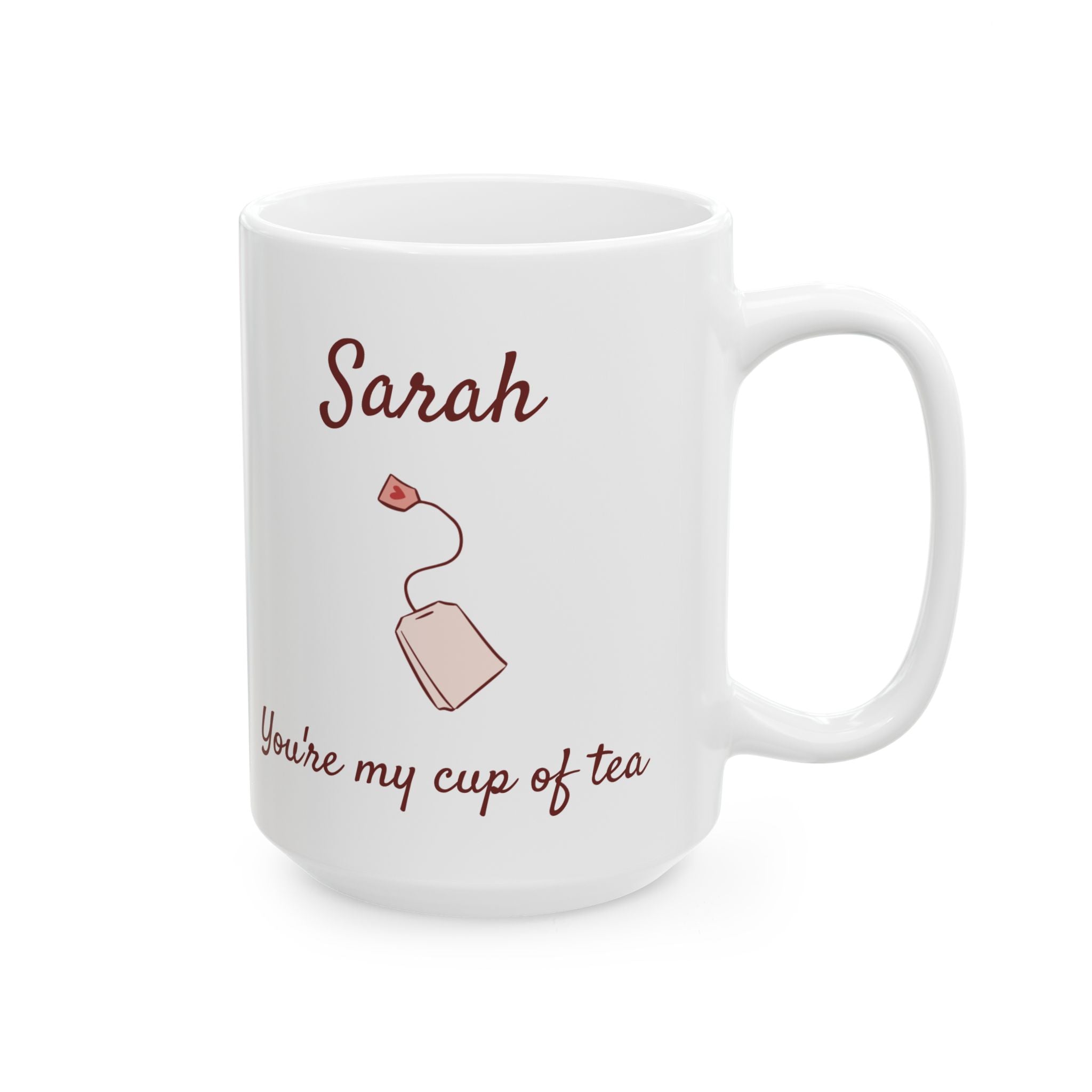 Cup of tea mug close-up showing name and minimalist tea bag design detail